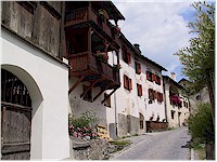 A narrow road passes through the heart of Guarda