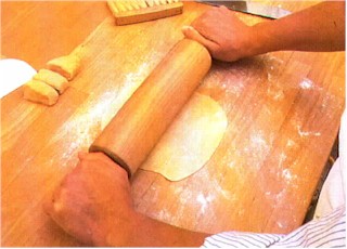 Roll the dough as thin as possible