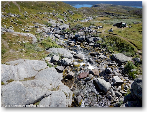 blick von der bruecke auf den jakkejakatj - flussabwaerts