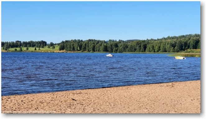 sandstrand beim first camp sunne am noerdlichen ende des mellan fryken